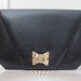 CHARLES JOURDAN - 1980s Designer Black Leather Envelope Clutch with Gold Bow - vintage purse with optional Crossbody Shoulder Strap