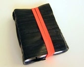 Recycled journal, bike inner tube, blank pages, grey linen and neon orange elastic closure, small.