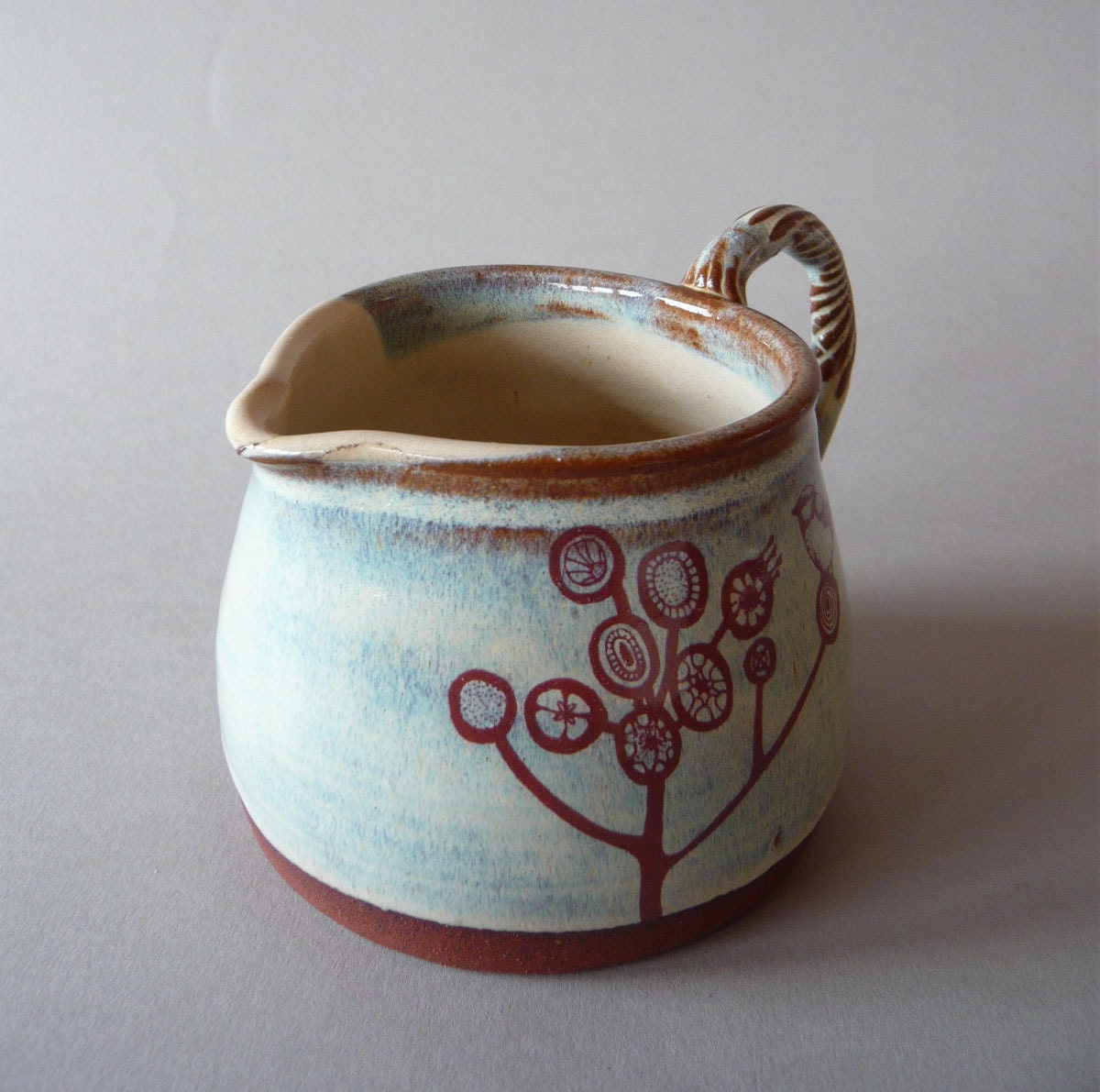 Red Bird in Tree Jug