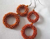 Rustic Double beaded hoops GYPSY earrings. Terra cotta tangerine orange glass beads. 3 inches long
