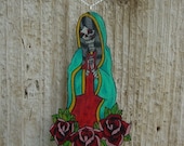 tattoo style guadalupe de los muertos with vintage roses necklace