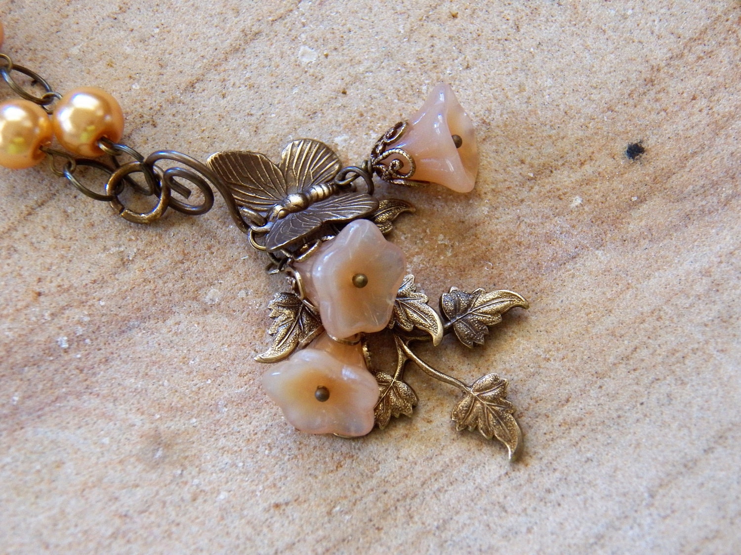 Nature Inspired Necklace with Peach Pearls and Brass Branches with a Brass Butterfly ...Three Peach Bell Flowers