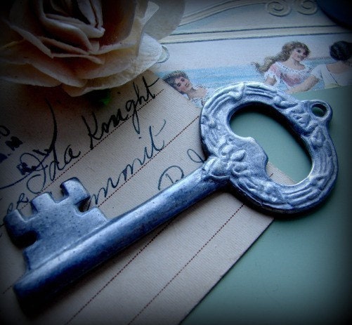 Two big silver decorative key pendants