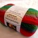 Boutique Unforgettable yarn in Parrot, bright shades of red, green, blue worsted weight, Red Heart Boutique