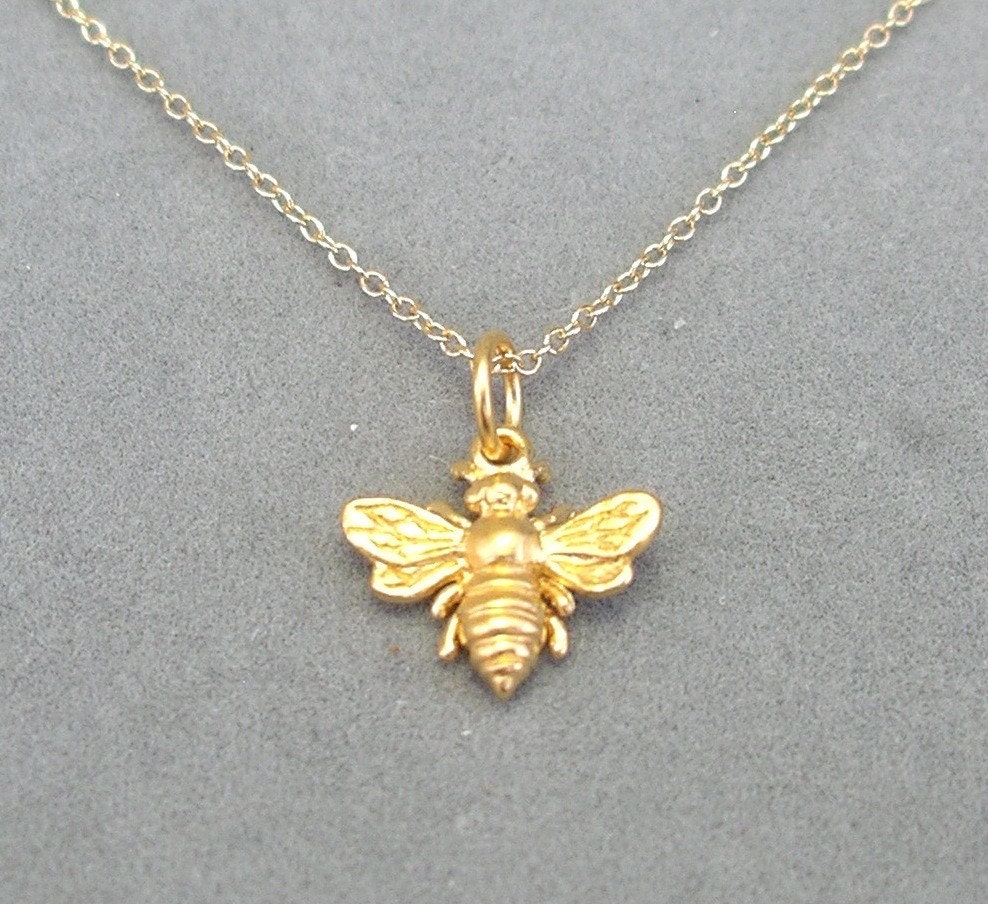 tiny gold bee charm necklace by rockedjewelry