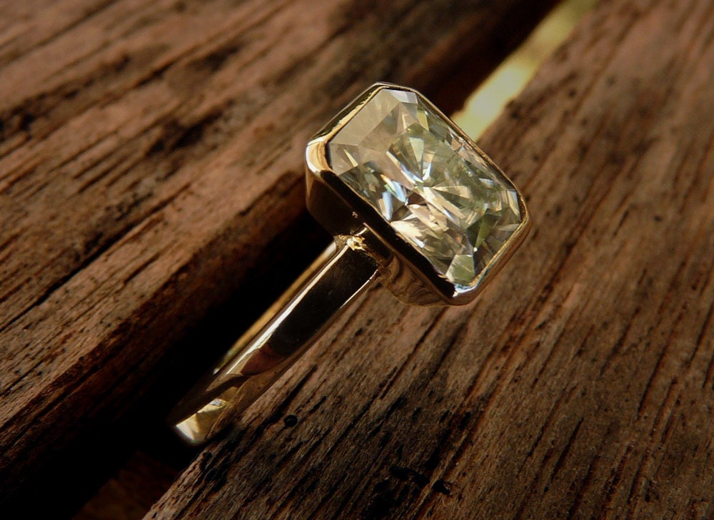 14 karat Pink gold and Moissanite Engagement ring