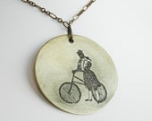 Gal with her Bicycle Etched Brass Pendant