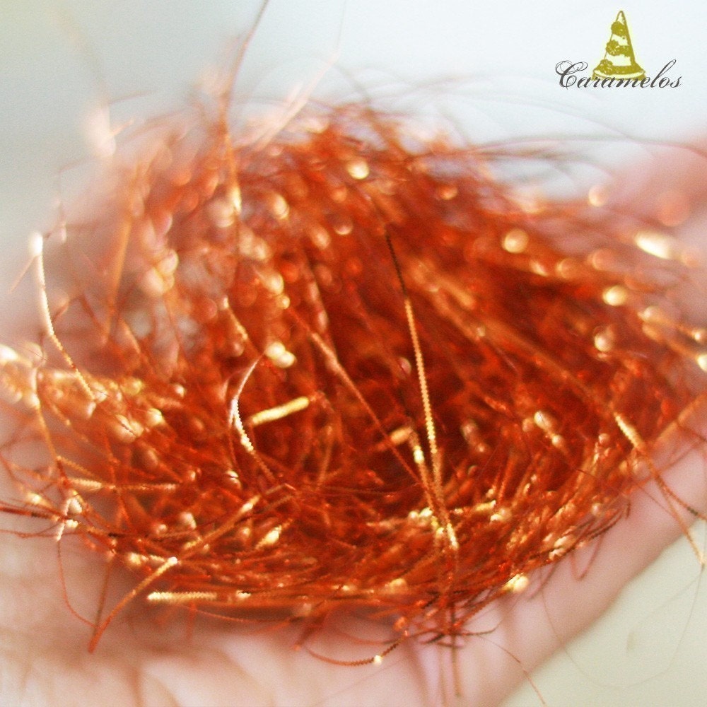 sparkle orange tinsel shred by caramelos on etsy sparkle orange tinsel shred by caramelos on etsy