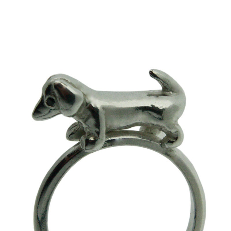 Sausage Dog Dachshund Ring. Hand crafted in Silver with Black Diamond eyes.