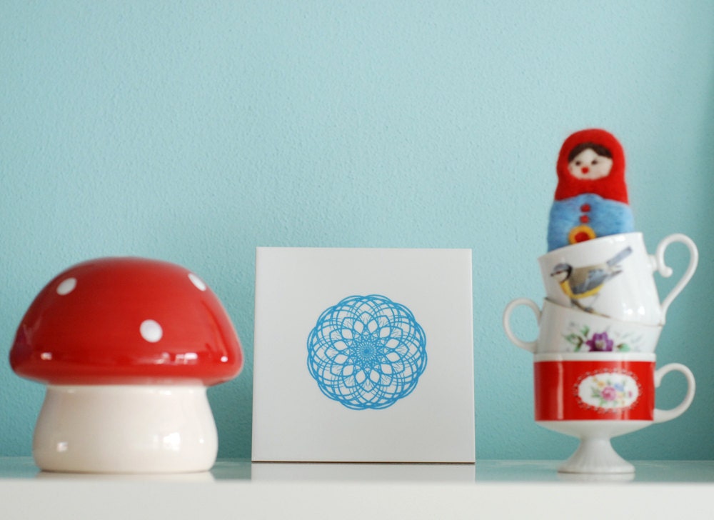 Screenprinted tile light blue spirograph