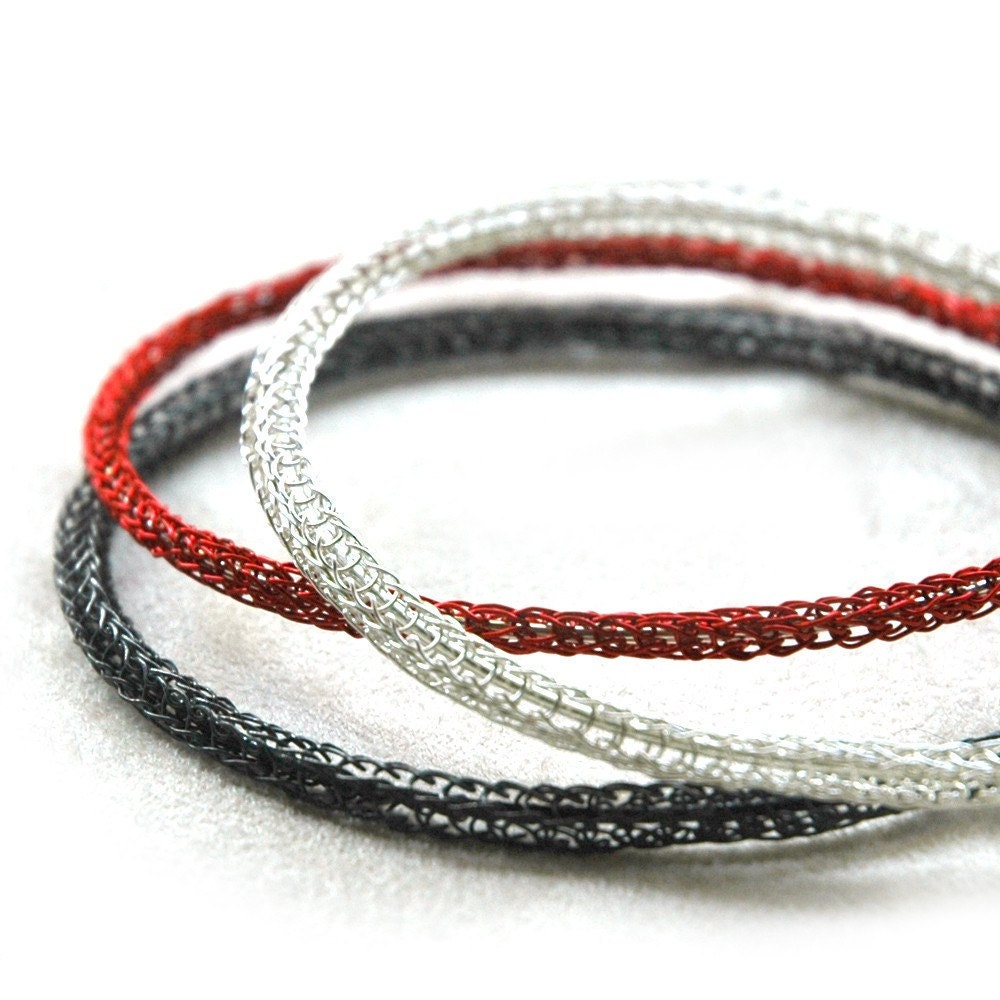 3  bangle bracelets, red bangle, white streling silver bangle and oxidized silver bangle