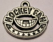 Hockey Fan with Missing front teeth Charms 15 pieces.