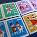 folk children - Romanian - postage stamp ephemera - 2 sets