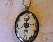 Creepy skeleton oddity necklace