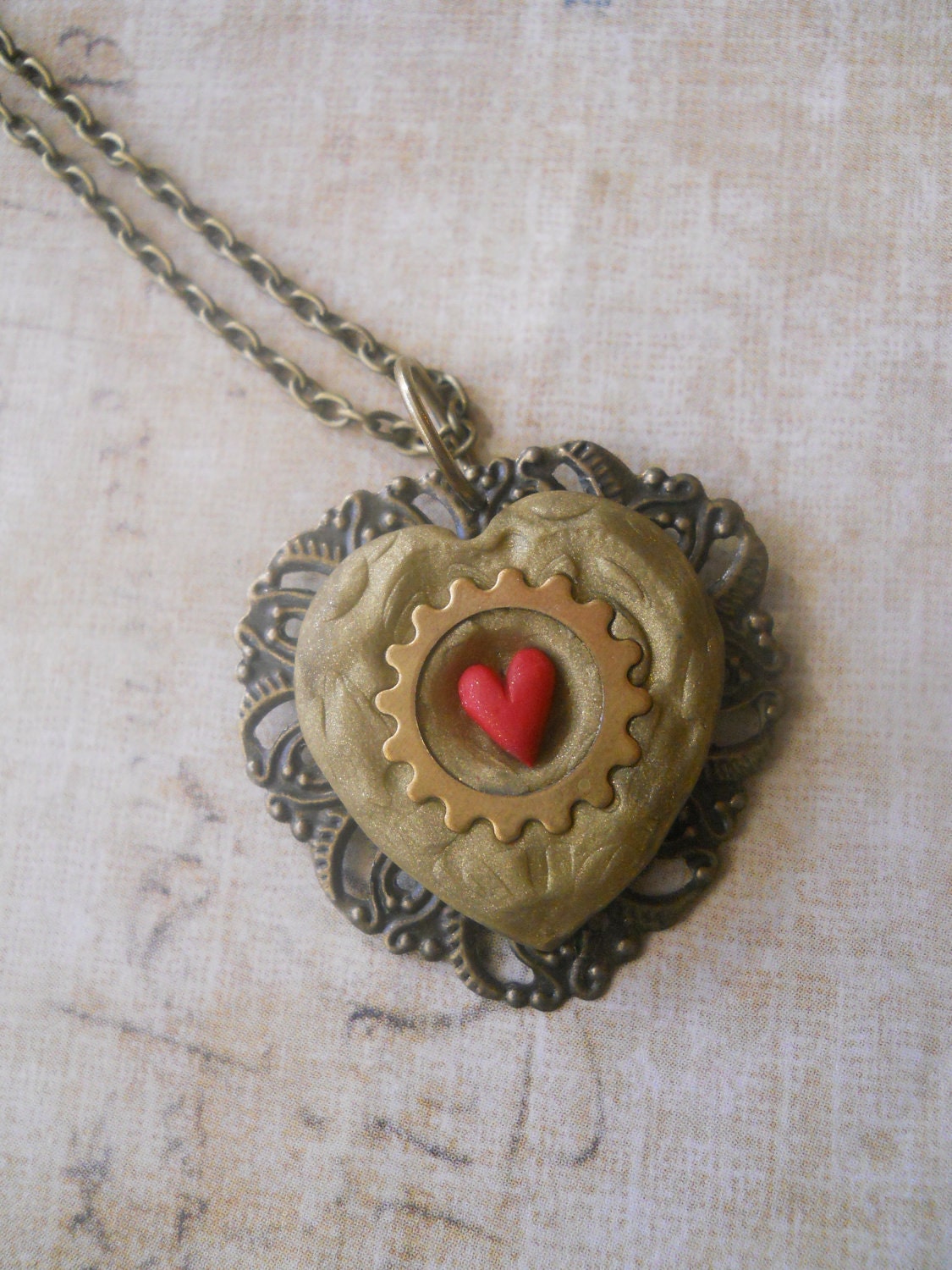 Heart container necklace