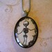 Creepy skeleton oddity necklace