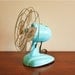 Refurbished vintage electric Wizard fan in aqua blue