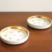 Pair of French fleur de lis porcelain dishes