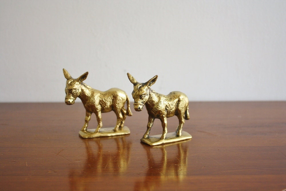 Antique pair of brass donkeys