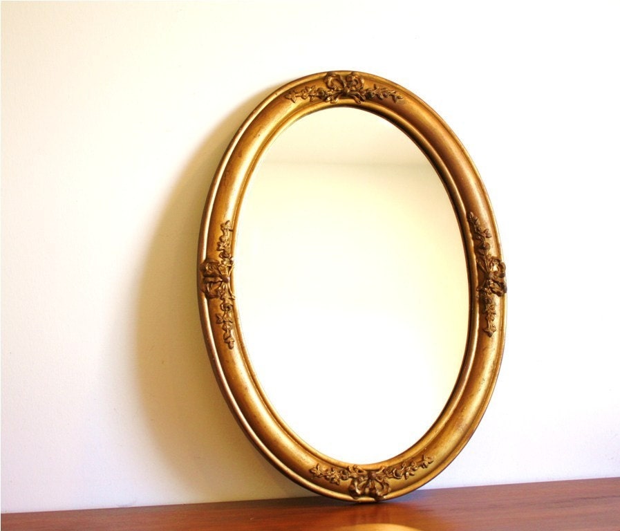 Vintage oval mirror with gold wood frame by highstreetmarket