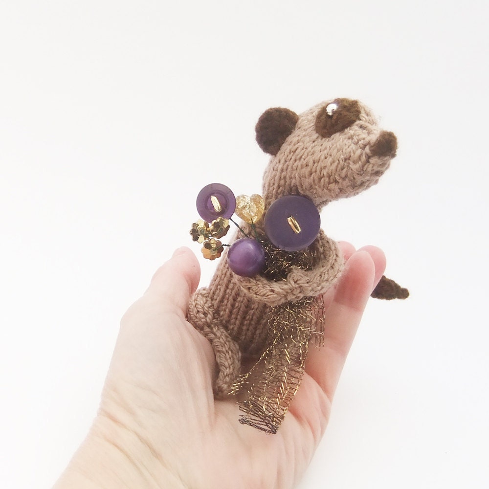 Handknitted Meerkat with flowers, purple and gold bouquet, button and beadflowers, I love you