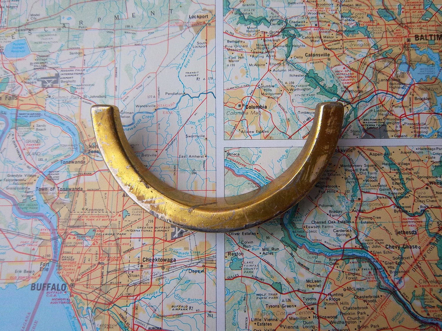 Vintage smile shaped shiny metal handle includes hardware