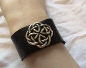 Celtic Knot Concho on an adjustable black chap leather wristband tie - 1.25 inch wide band