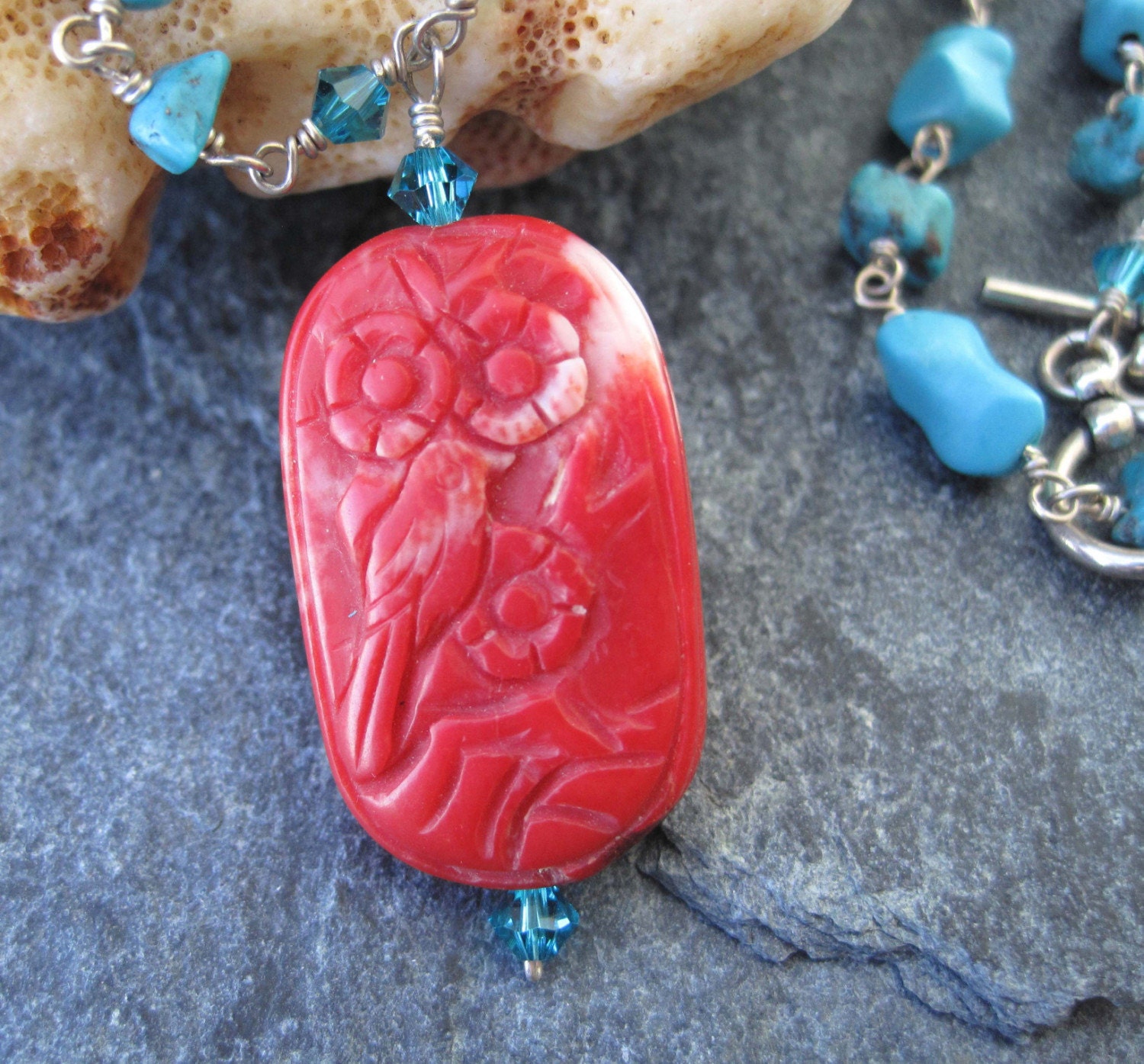 Turquoise, magnasite, red coral, and sterling silver necklace