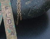 Add an additional aged brass name plate-madre de olivia