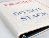 Quilted cover with text for 3 ring American file binder