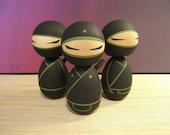 Kokeshi doll.  Ninja of your choice Black and olive version