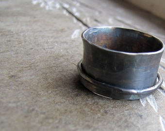 Rustic dark sterling spinner ring