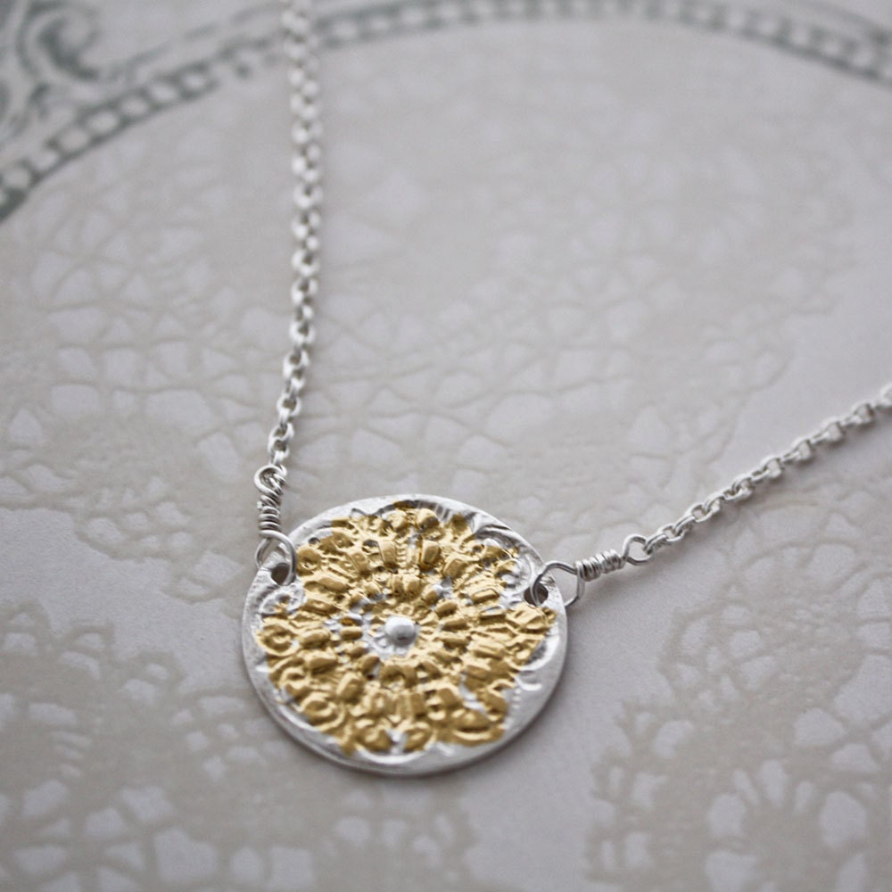 golden medallion...a fine silver necklace with 24 karat gold