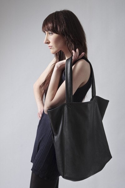 Black leather tote with silver lining