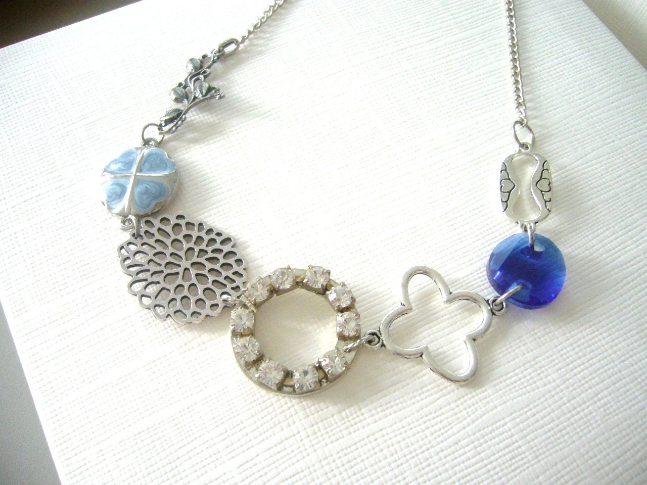 Chunky silver, blue necklace with rhinestones