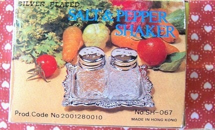 silver plated salt and pepper set with tray