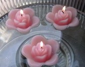12 LIght pink floating rose wedding candles for table centerpiece and reception decor.