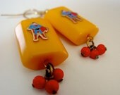 Super Hero comic book earrings . vintage 1970s Superman Bakelite baubles . bold primary brights red, cobalt blue, yellow