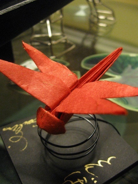 Origami Red Dragonfly , with decorative fine paper / on a spiral wire