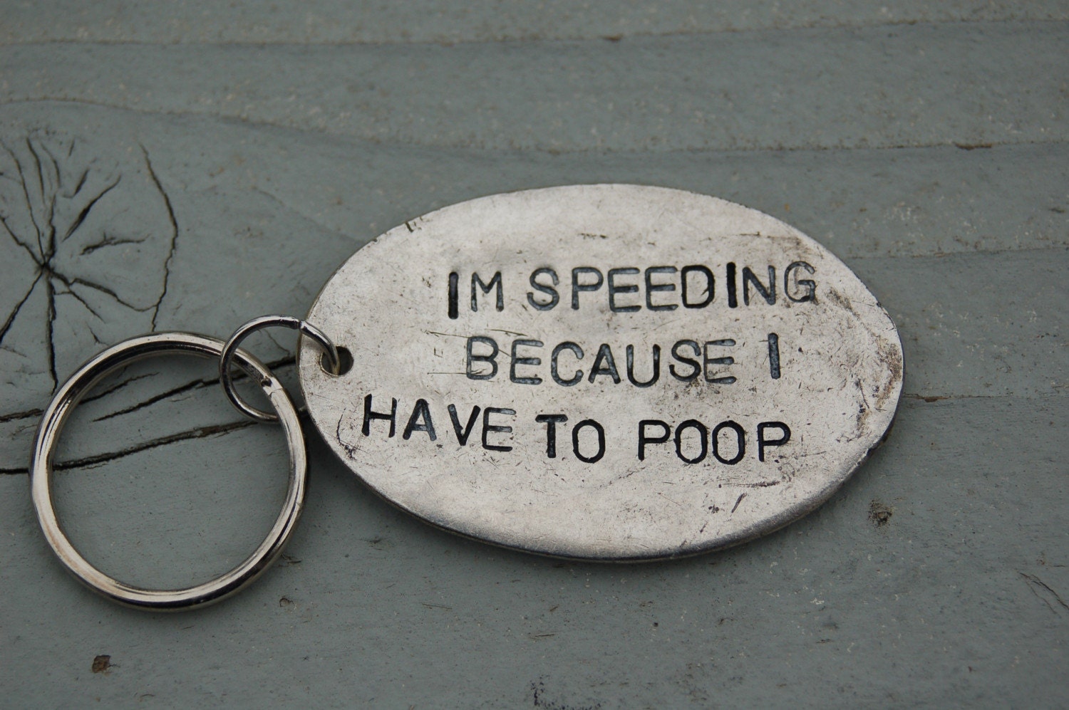 im speeding because i have to poop key ring