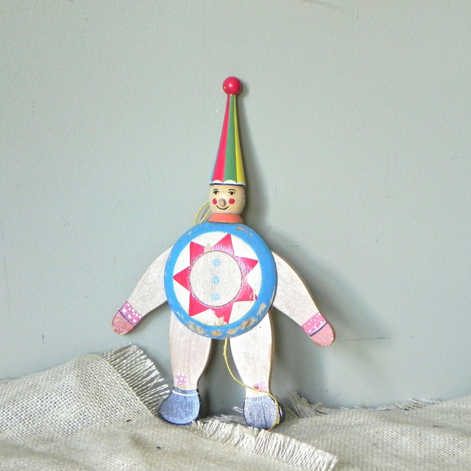 Vintage folk art clown toy figurine dancing dan circus blue green red yellow