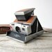 r e s e r v e d Polaroid SX-70 Land Camera with Tan Leather Case. Tested and Works.