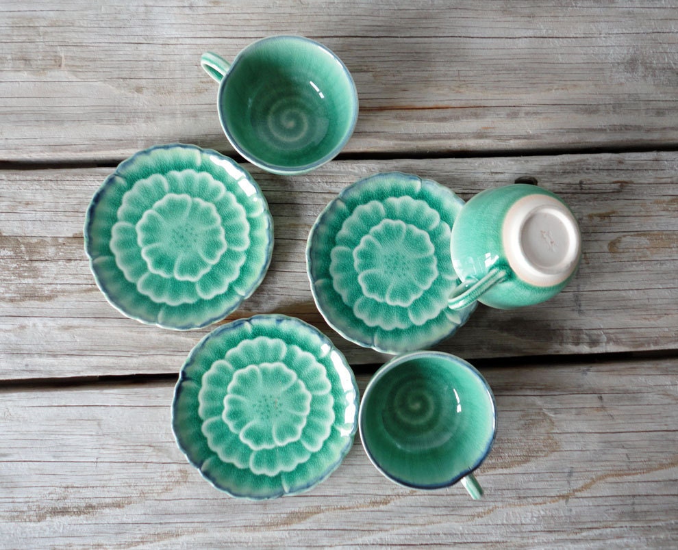 Kotobuki Japanese Tea Cups and Saucer. Green Glaze Flower Design.