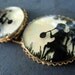 RESERVED Stunning Buckle Silhouettes over Mother of Pearl