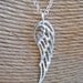 elegant silver angel wing necklace