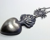 the poet's heart. reliquary locket in sterling silver.