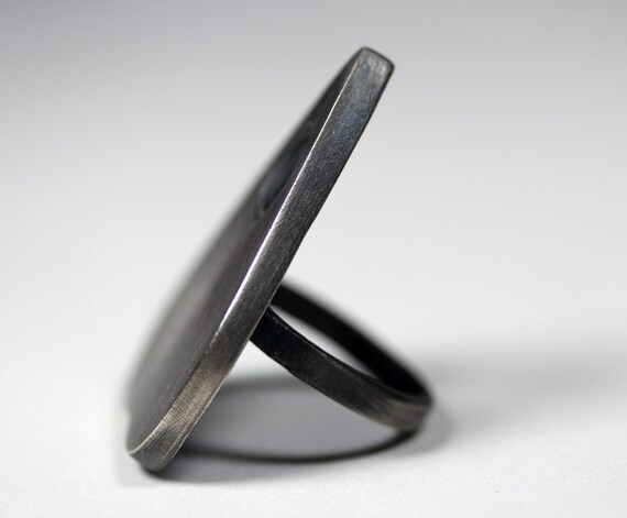 mini planchette oracle ring.