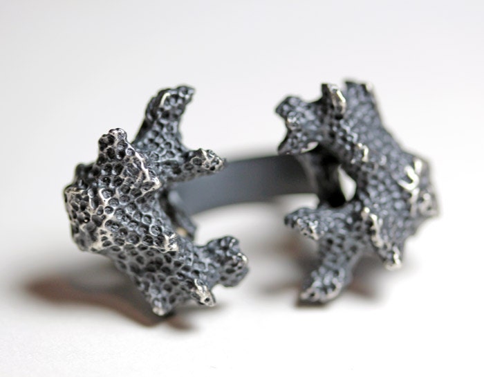 of his bones are coral made. twin coral ring.
