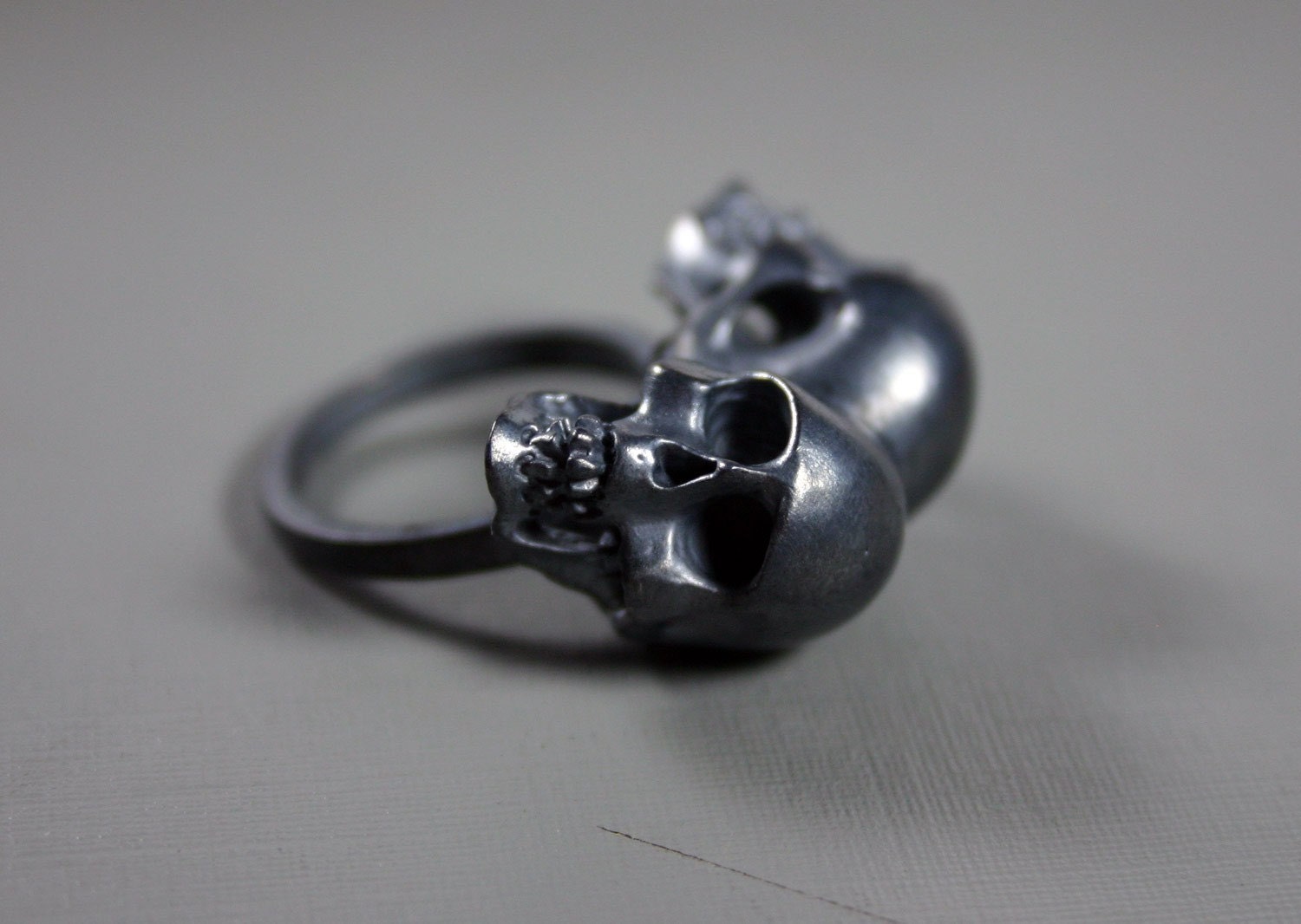 one of us. conjoined twin skull ring. sterling silver.