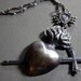 8 of swords. sterling tarot necklace.